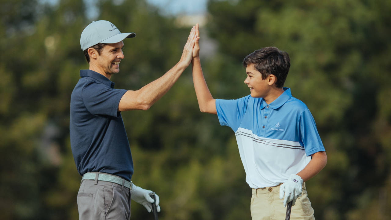 golfers high five