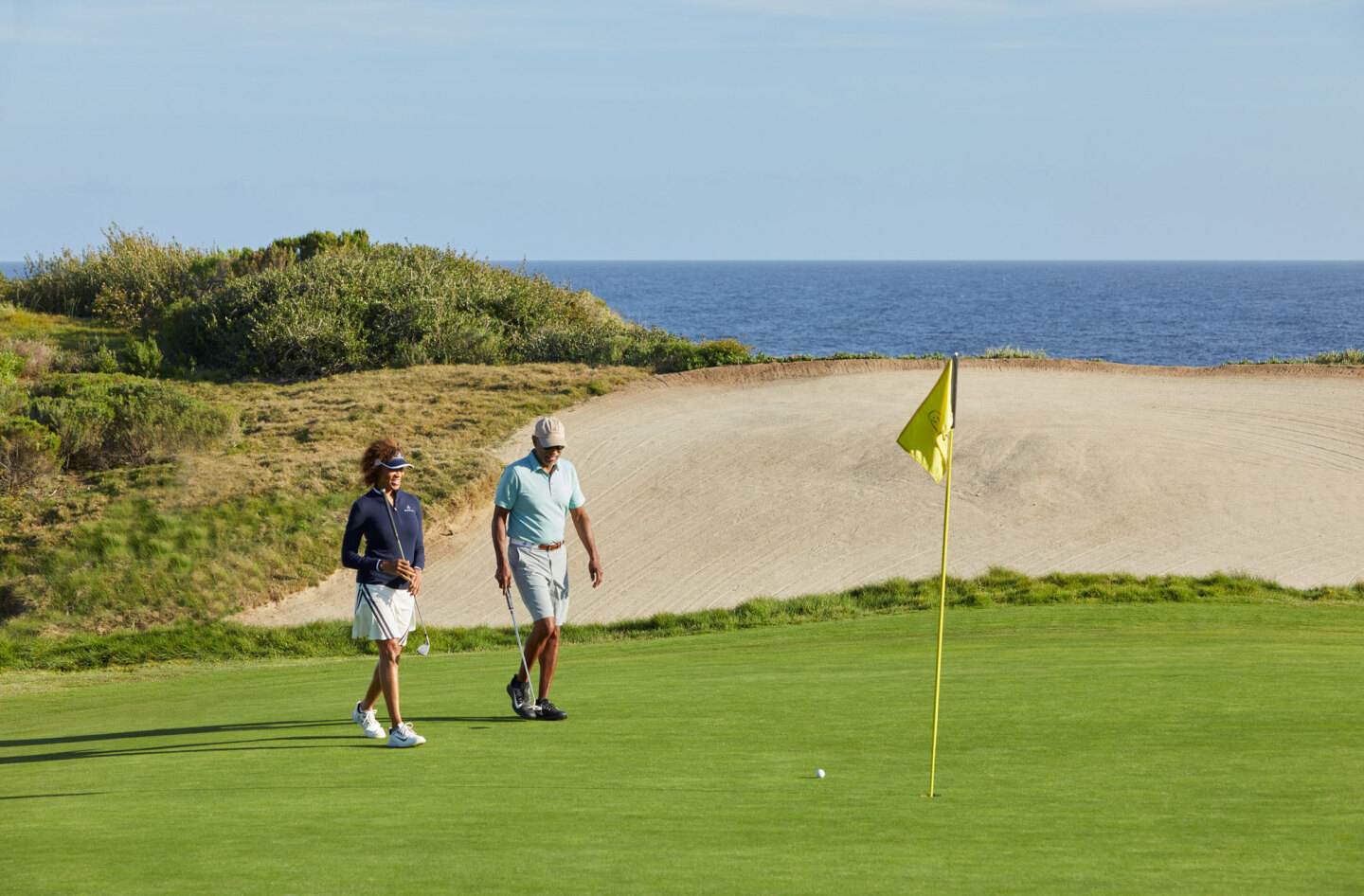 couple golfing